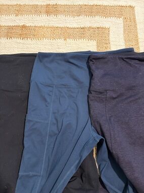 THREE pair Tuff Athletics leggings - EUC - medium - blue, black, purple